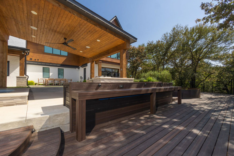 Minimalist backyard ground level deck photo