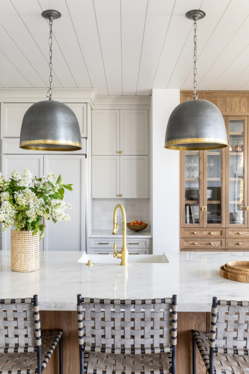 Modern kitchen with ready-to-assemble RTA cabinets, marble island, and shaker doors in Canada