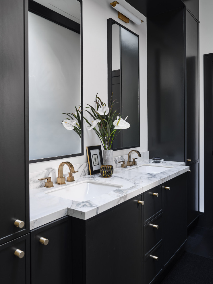 This is an example of a mid-sized eclectic master bathroom in San Francisco with flat-panel cabinets, black cabinets, an alcove shower, a one-piece toilet, grey walls, dark hardwood floors, an undermount sink, marble benchtops, black floor, a hinged shower door and white benchtops.