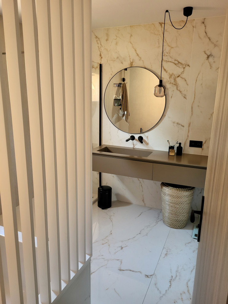 Medium sized contemporary ensuite bathroom in Montpellier with flat-panel cabinets, white cabinets, a claw-foot bath, a walk-in shower, a two-piece toilet, marble tiles, marble flooring, a trough sink, solid surface worktops, white floors, brown worktops, a single sink and a floating vanity unit.