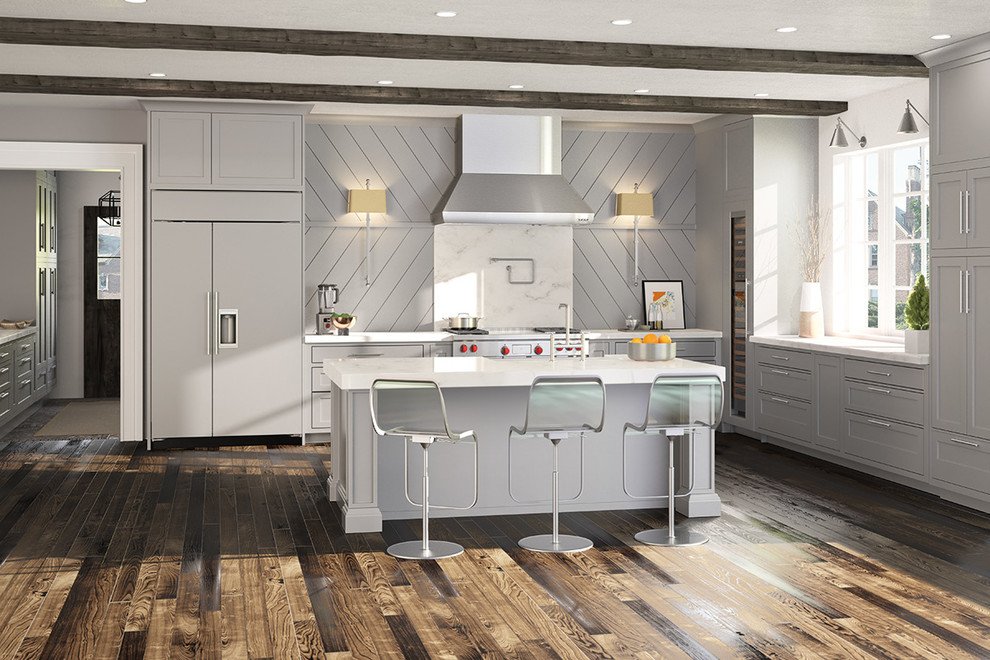 Example of a mid-sized transitional eat-in kitchen design in Orange County with an island