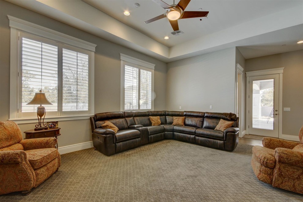 Large transitional look-out medium tone wood floor and beige floor basement photo in Phoenix with gray walls