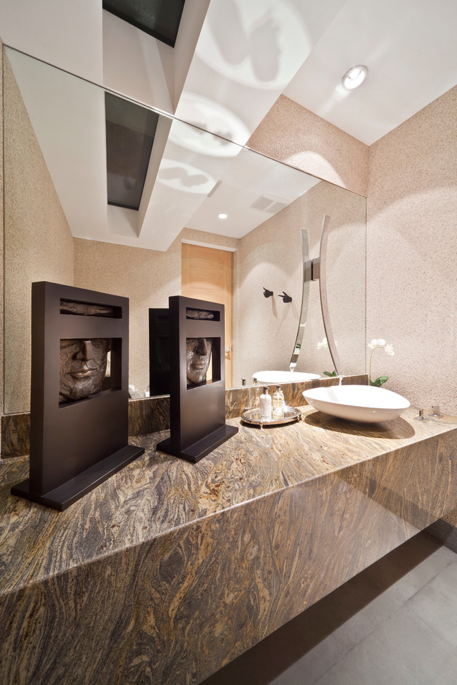 Inspiration for a contemporary powder room in Other.
