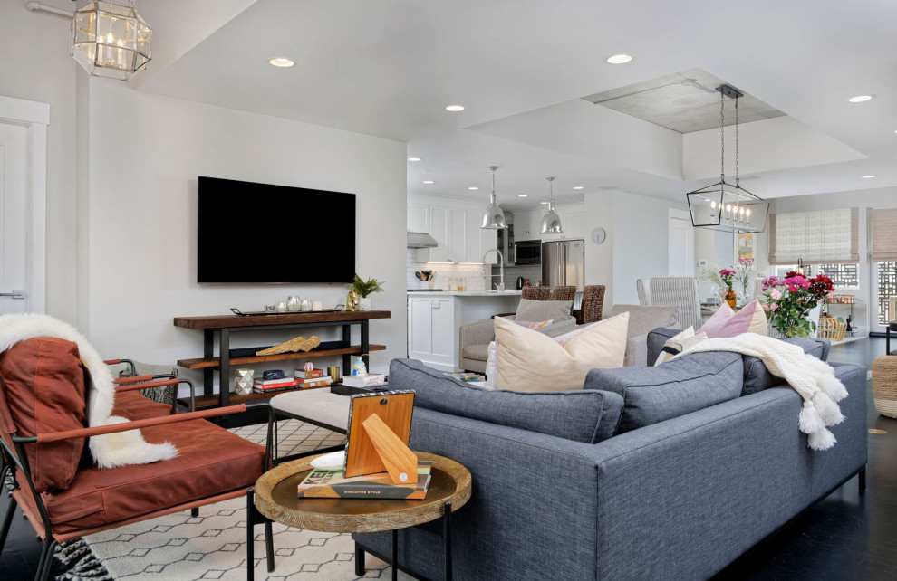 Inspiration for a mid-sized contemporary formal open concept living room in Santa Barbara with dark hardwood floors, no fireplace and a wall-mounted tv.