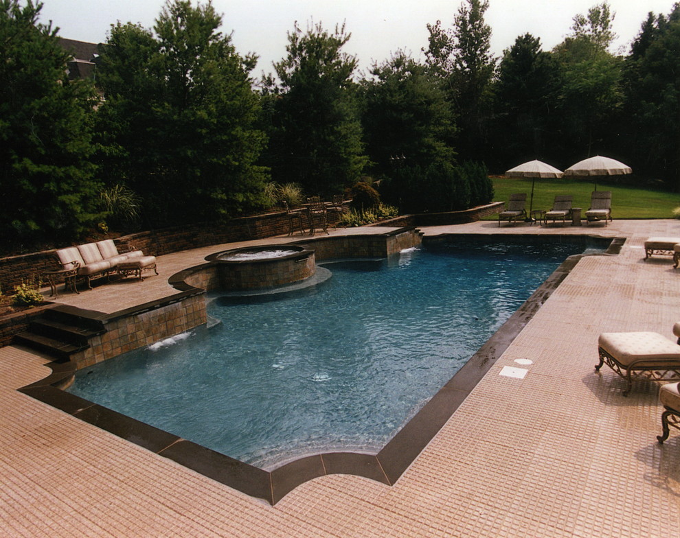 Inspiration for an expansive modern pool in Newark.