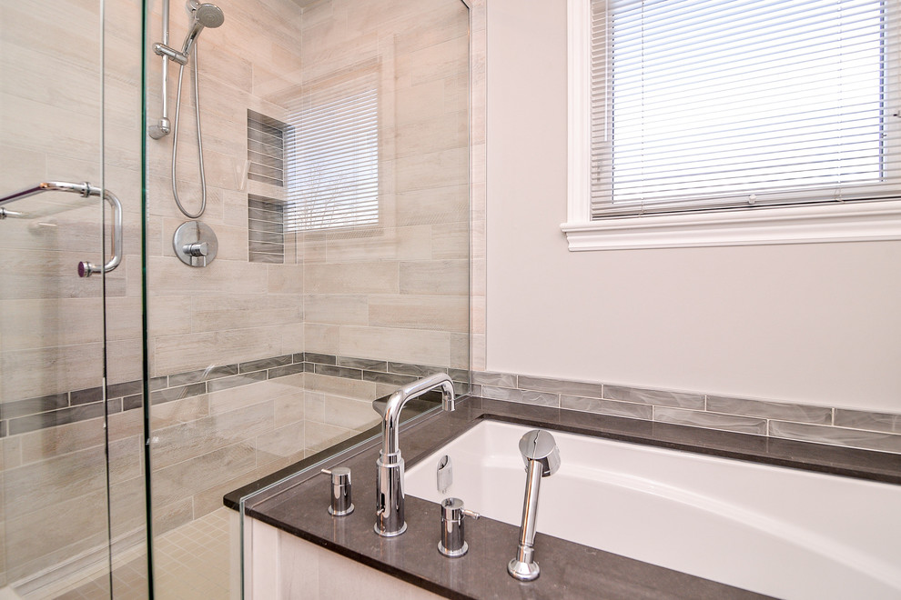 Mid-sized contemporary master bathroom in Ottawa with an undermount sink, shaker cabinets, dark wood cabinets, an undermount tub, a shower/bathtub combo, a two-piece toilet, beige tile, glass tile, beige walls and ceramic floors.