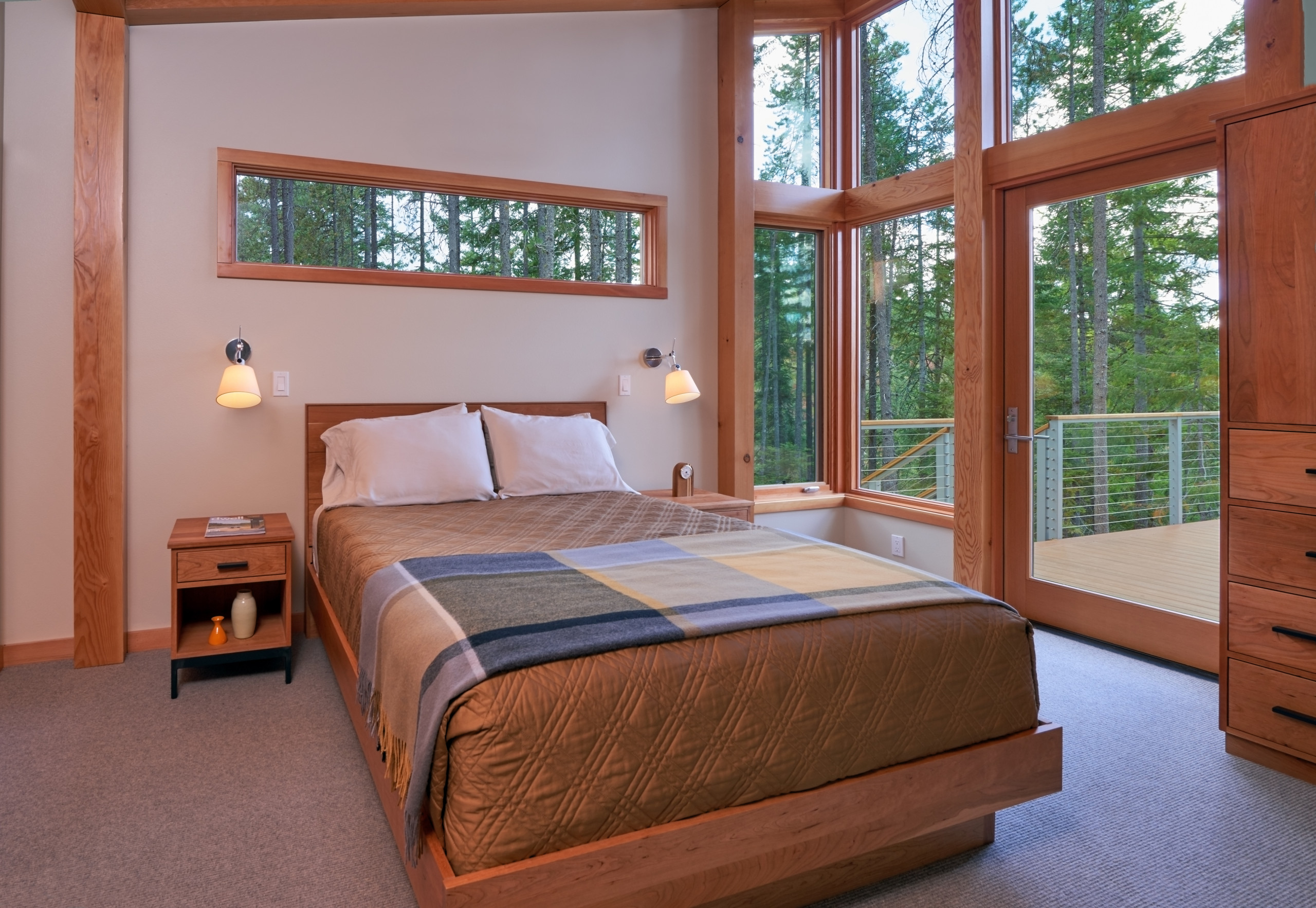 Horizontal window in the master bedroom, offering additional light and views.