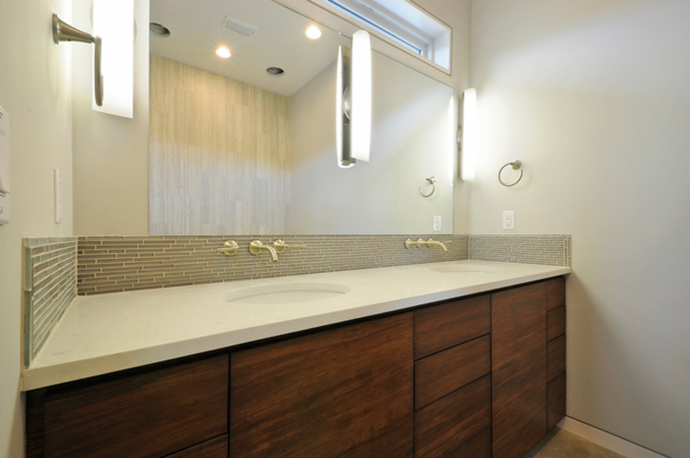 Design ideas for a mid-sized contemporary master bathroom in Austin with an undermount sink, flat-panel cabinets, dark wood cabinets, engineered quartz benchtops, a freestanding tub, an open shower, gray tile, glass sheet wall, grey walls and concrete floors.