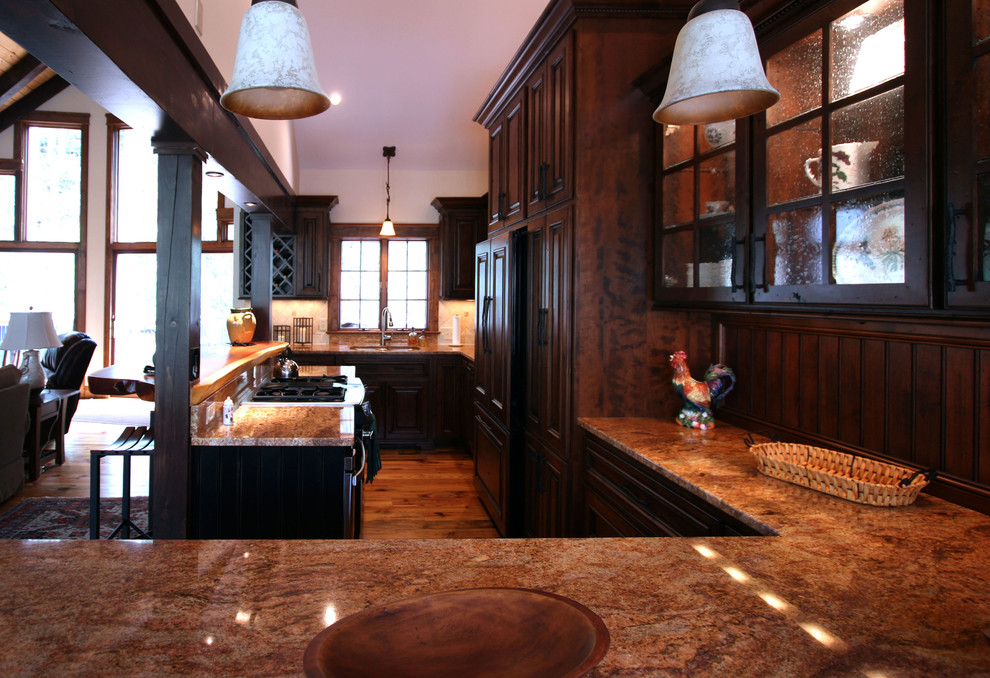 Inspiration for a rustic eat-in kitchen remodel in Charlotte with an undermount sink and medium tone wood cabinets