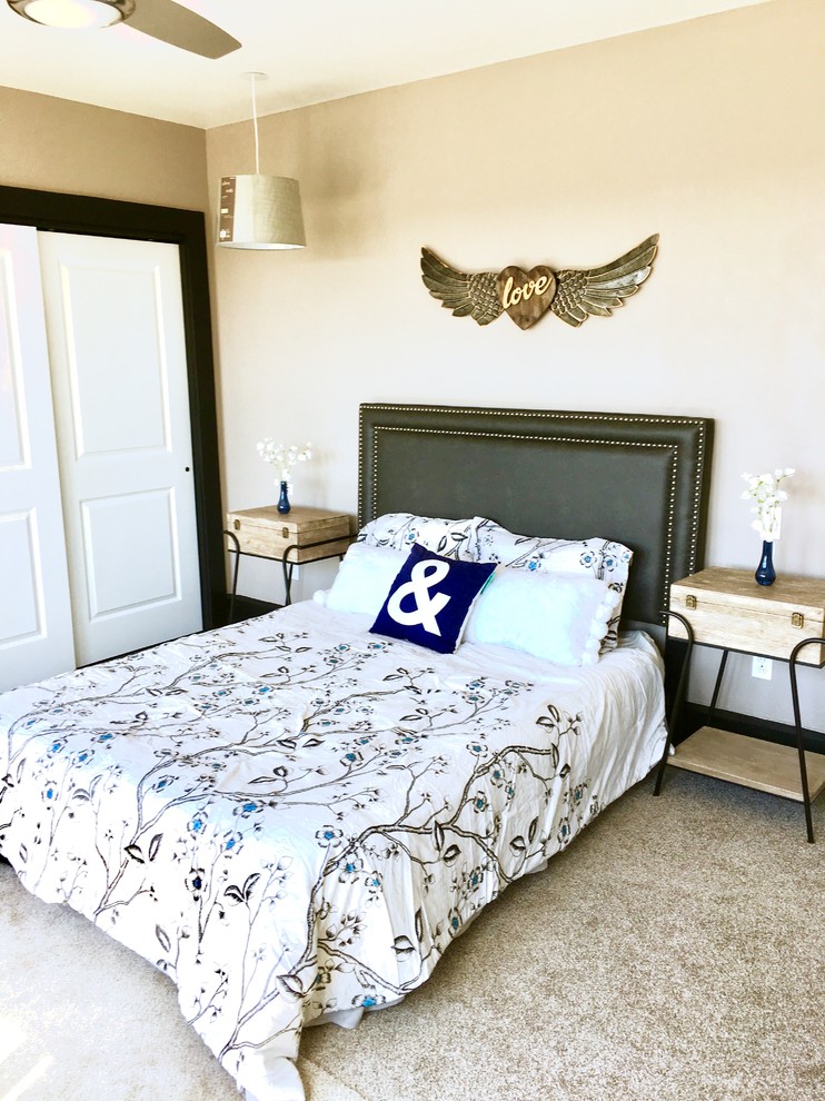 Large transitional master carpeted and gray floor bedroom photo with gray walls