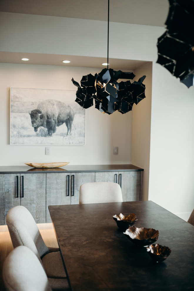 Dining room - rustic dining room idea in Denver