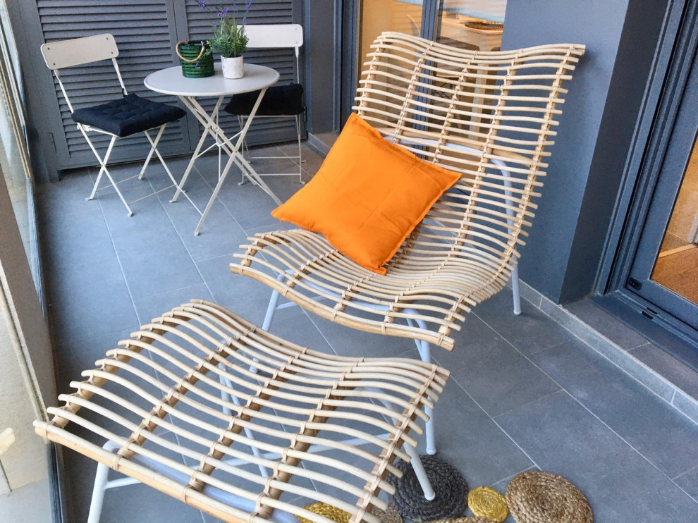 Diseño de terraza actual con barandilla de vidrio