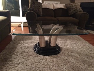 is this faux elephant tusk table set worth anything? is this faux elephant tusk table set worth anything?