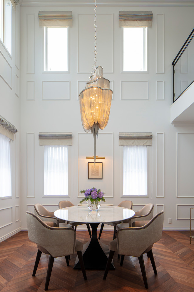 Inspiration for a victorian medium tone wood floor and brown floor dining room remodel in Tokyo with white walls