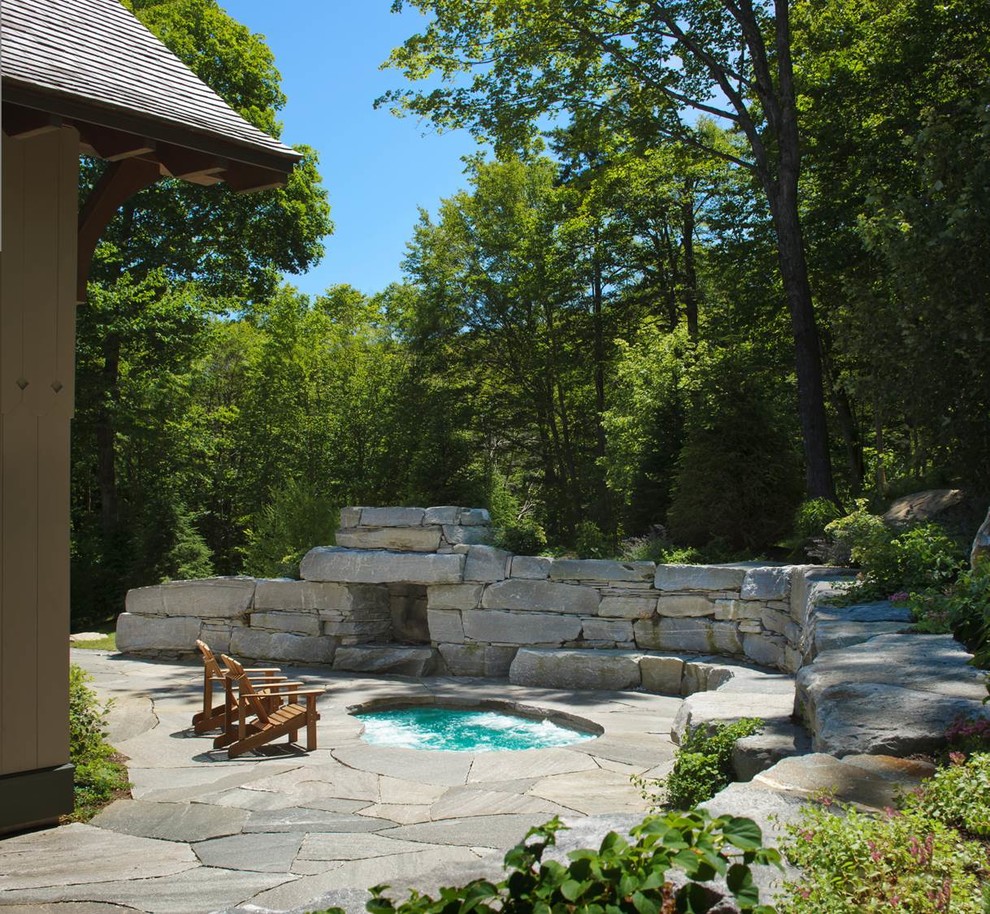 Country patio in New York with natural stone pavers.