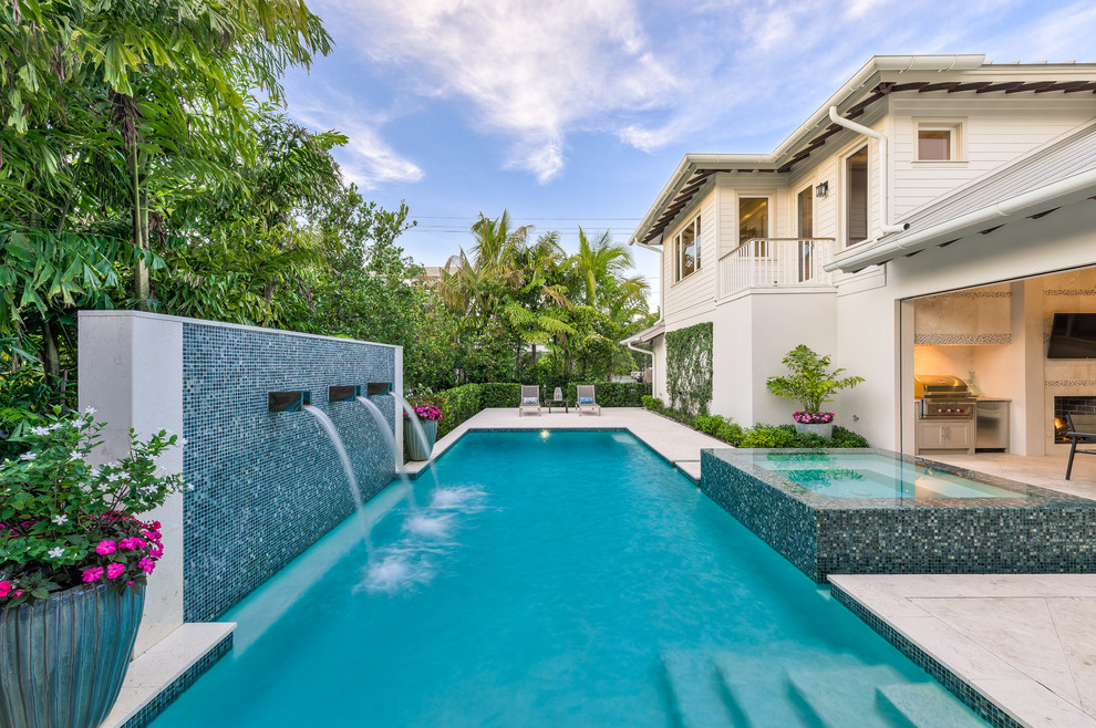 Inspiration for a transitional pool in Miami.