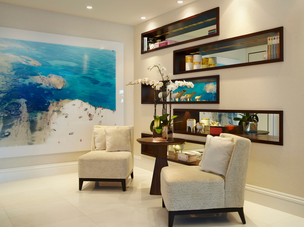 This is an example of a contemporary living room in Miami with beige walls.