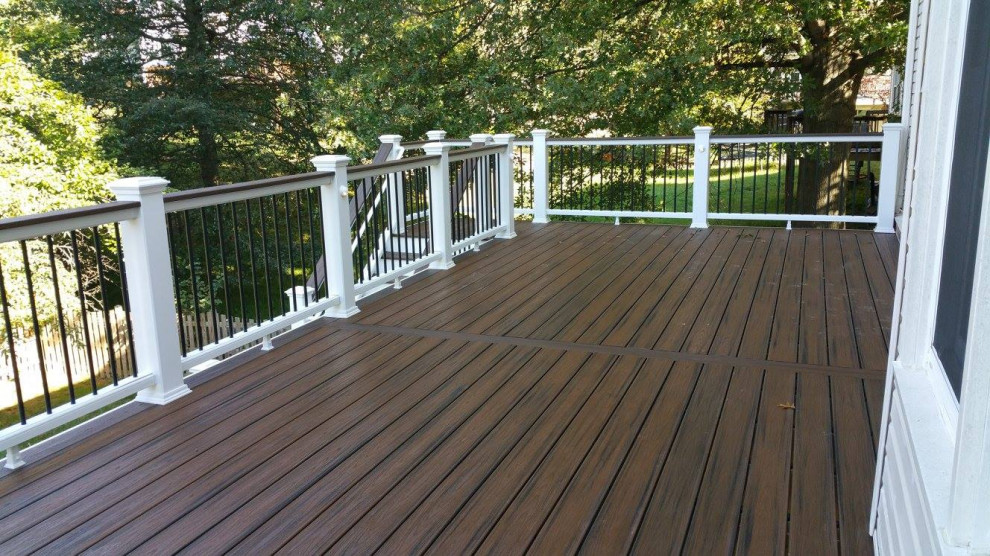 Inspiration for a large backyard deck remodel