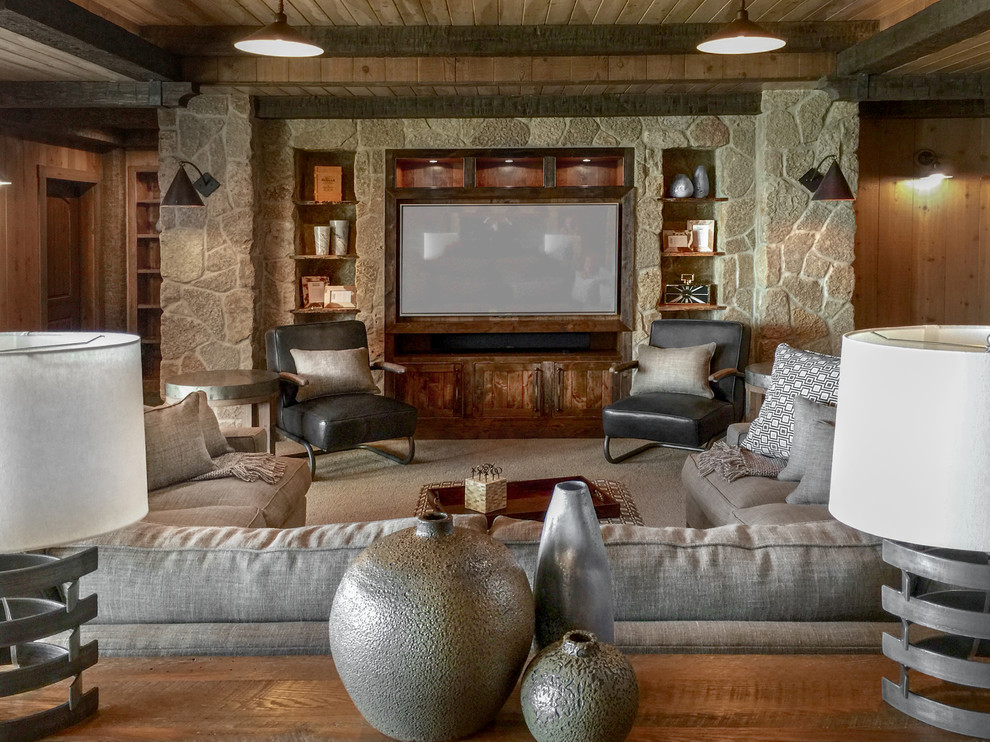 Inspiration for a country family room in Detroit with carpet, a wall-mounted tv and beige floor.