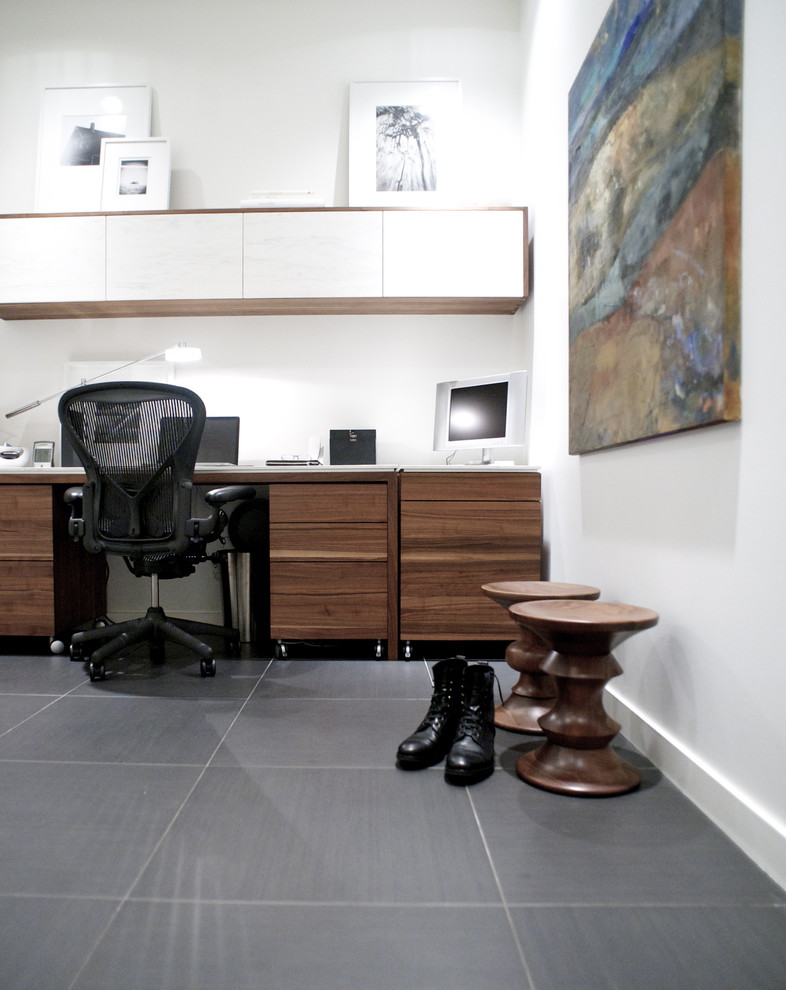 Photo of a contemporary home office in Vancouver with a built-in desk.
