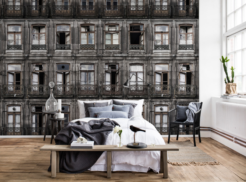 Mid-sized scandinavian master bedroom in Gothenburg with grey walls, medium hardwood floors and beige floor.