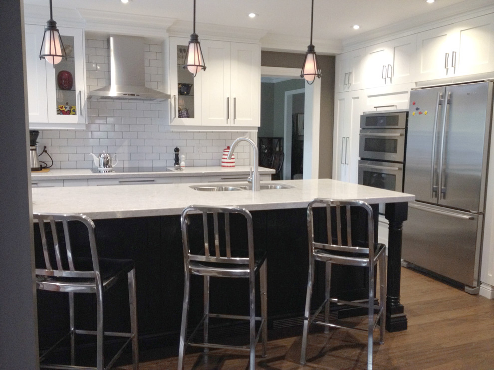 This is an example of a large modern kitchen in Toronto.