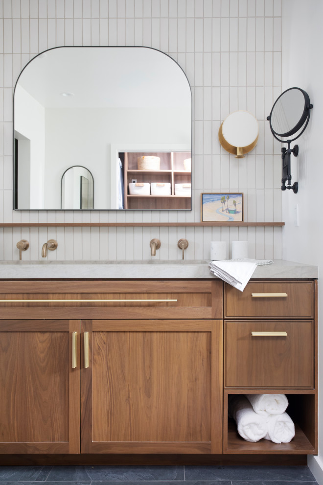 Design ideas for a large midcentury master bathroom in Los Angeles with shaker cabinets, medium wood cabinets, a one-piece toilet, gray tile, white walls, an undermount sink, engineered quartz benchtops, grey floor, a hinged shower door, grey benchtops, a shower seat, a single vanity and a built-in vanity.
