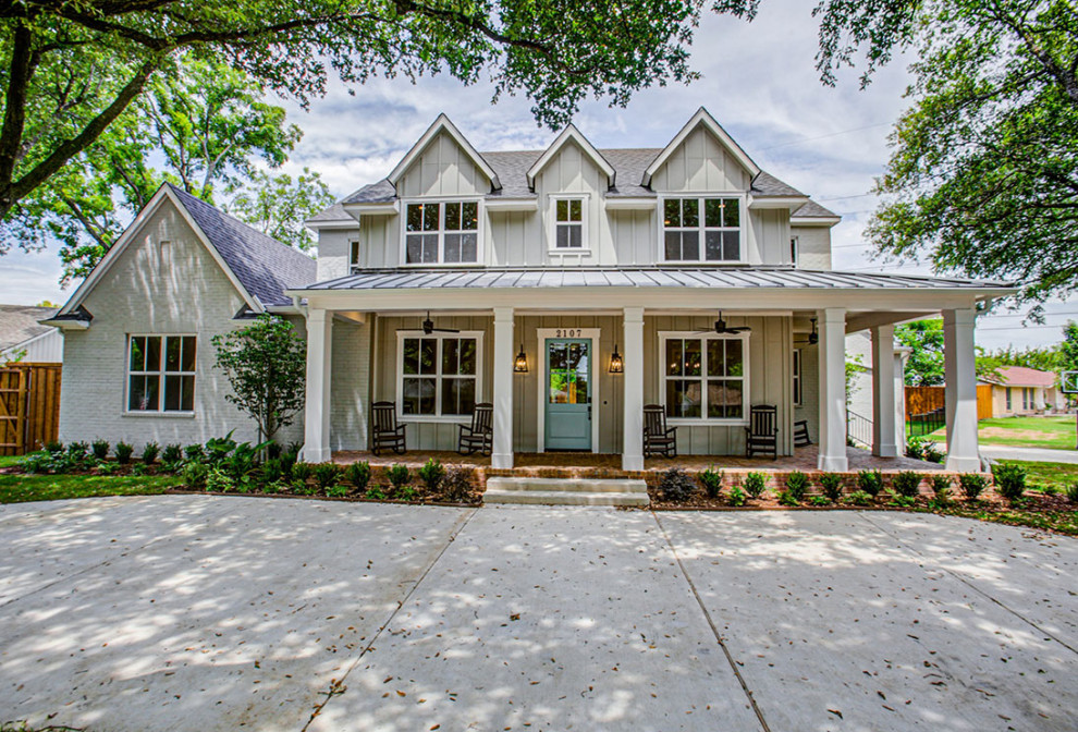 Large arts and crafts two-storey house exterior in Dallas with a mixed roof.