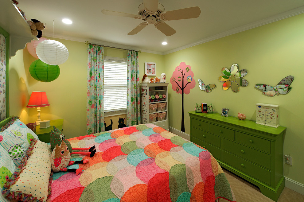 Inspiration for a traditional kids' bedroom for kids 4-10 years old and girls in DC Metro with green walls and carpet.