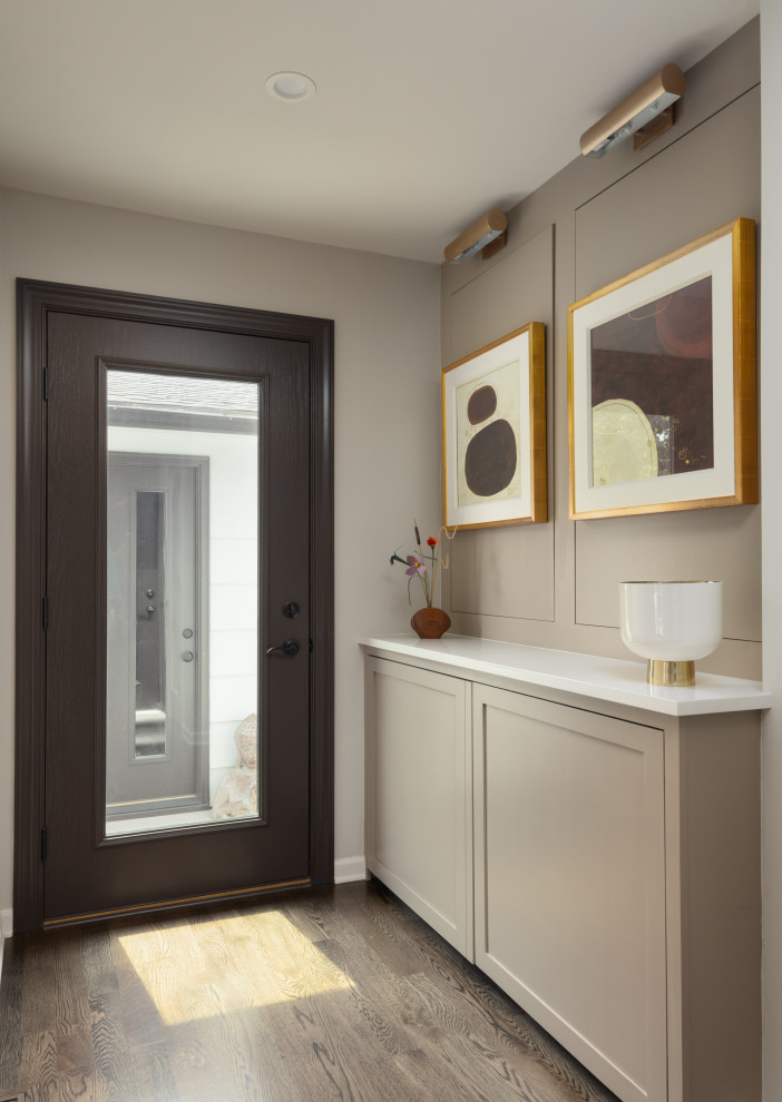 Inspiration for a small transitional foyer in Other with grey walls, terra-cotta floors, a single front door, a brown front door and grey floor.