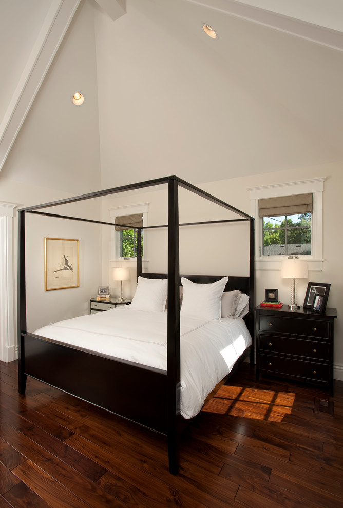 Photo of a mid-sized transitional master bedroom in Salt Lake City with white walls and dark hardwood floors.