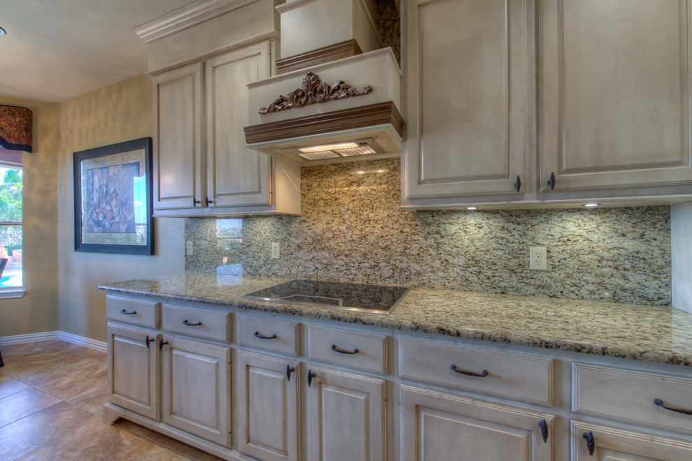 Inspiration for a mid-sized rustic l-shaped eat-in kitchen remodel in Austin with a single-bowl sink, wood countertops, stainless steel appliances and an island