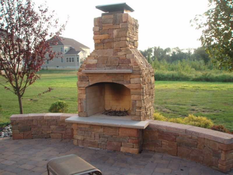 Outdoor Fireplace with Custom Brick Design Elements in New ...