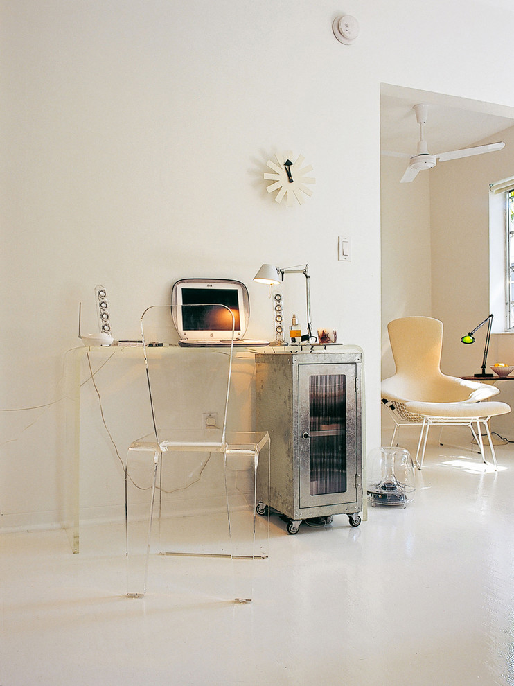 Small industrial study room in Other with white walls, concrete floors, no fireplace and a freestanding desk.