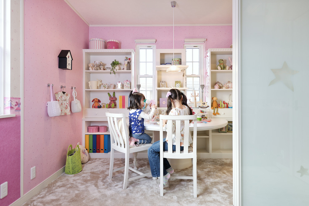 Inspiration for a traditional kids' playroom for kids 4-10 years old and girls in Tokyo with pink walls and carpet.
