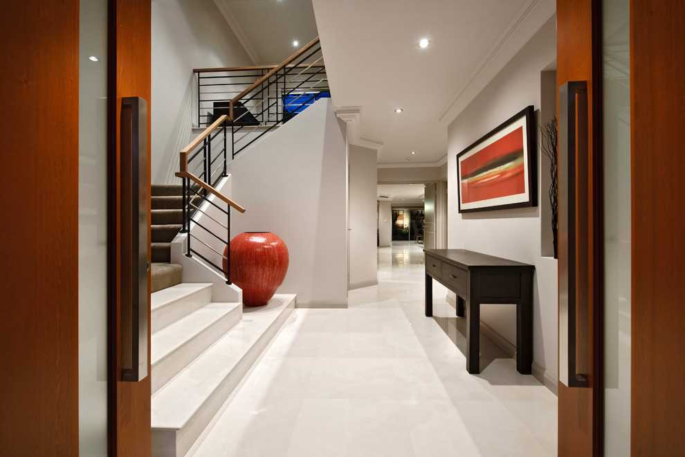 Photo of a contemporary entryway in Perth with grey walls, a double front door and white floor.