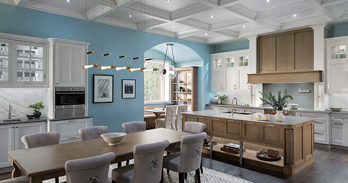 Example of a large transitional u-shaped dark wood floor, brown floor and coffered ceiling eat-in kitchen design in Chicago with a drop-in sink, beaded inset cabinets, white cabinets, quartzite countertops, beige backsplash, marble backsplash, stainless steel appliances, an island and gray countertops