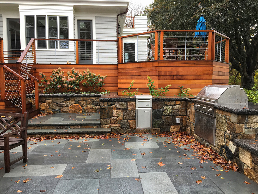 Example of a transitional home design design in Boston