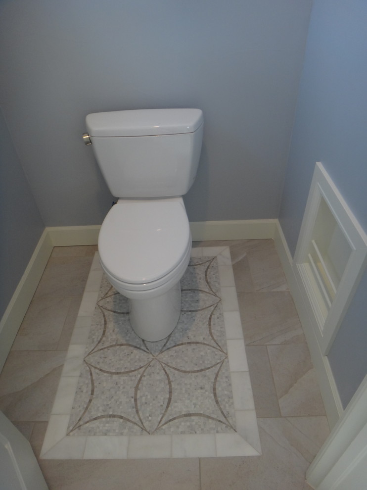 Photo of a mid-sized transitional master bathroom in Denver with an alcove shower, a two-piece toilet, gray tile, porcelain tile, blue walls and porcelain floors.