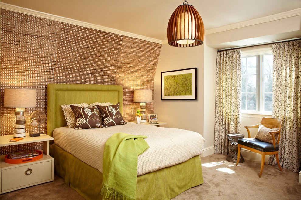 This is an example of a transitional guest bedroom in New York with carpet.