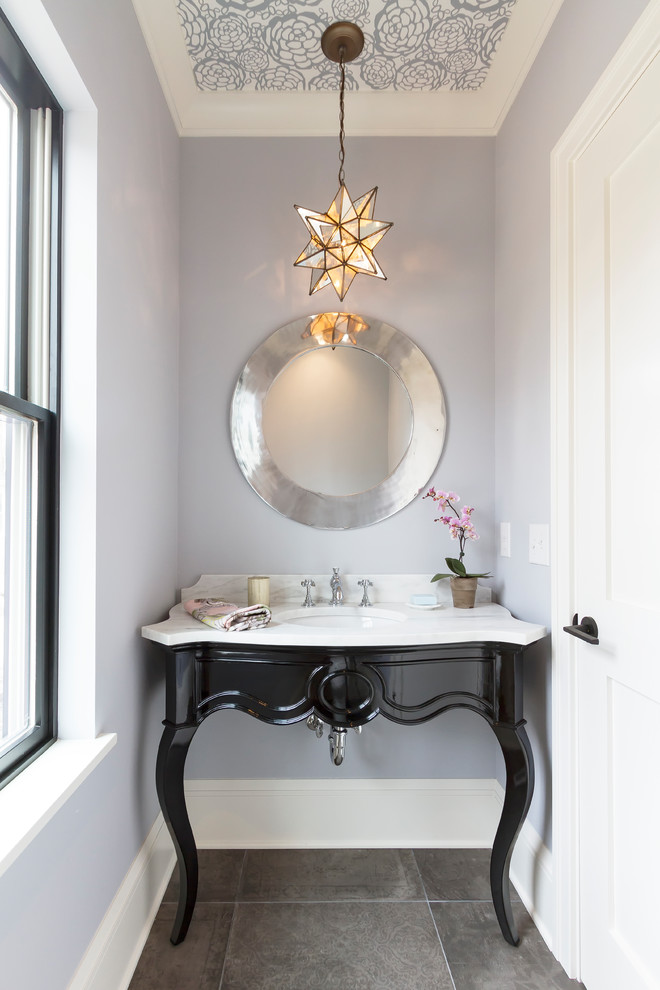 Inspiration for a small transitional powder room in Minneapolis with black cabinets, grey walls, porcelain floors, an undermount sink, marble benchtops and grey floor.