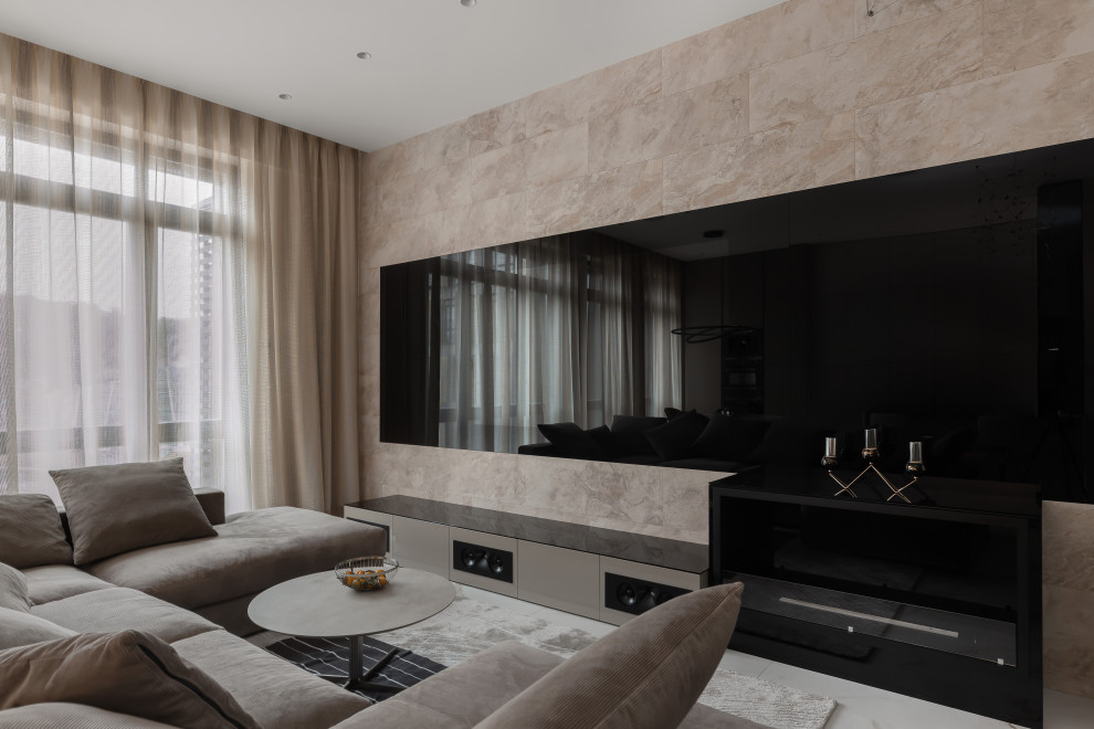 Large contemporary open concept home theatre in Moscow with beige walls, a built-in media wall and white floor.