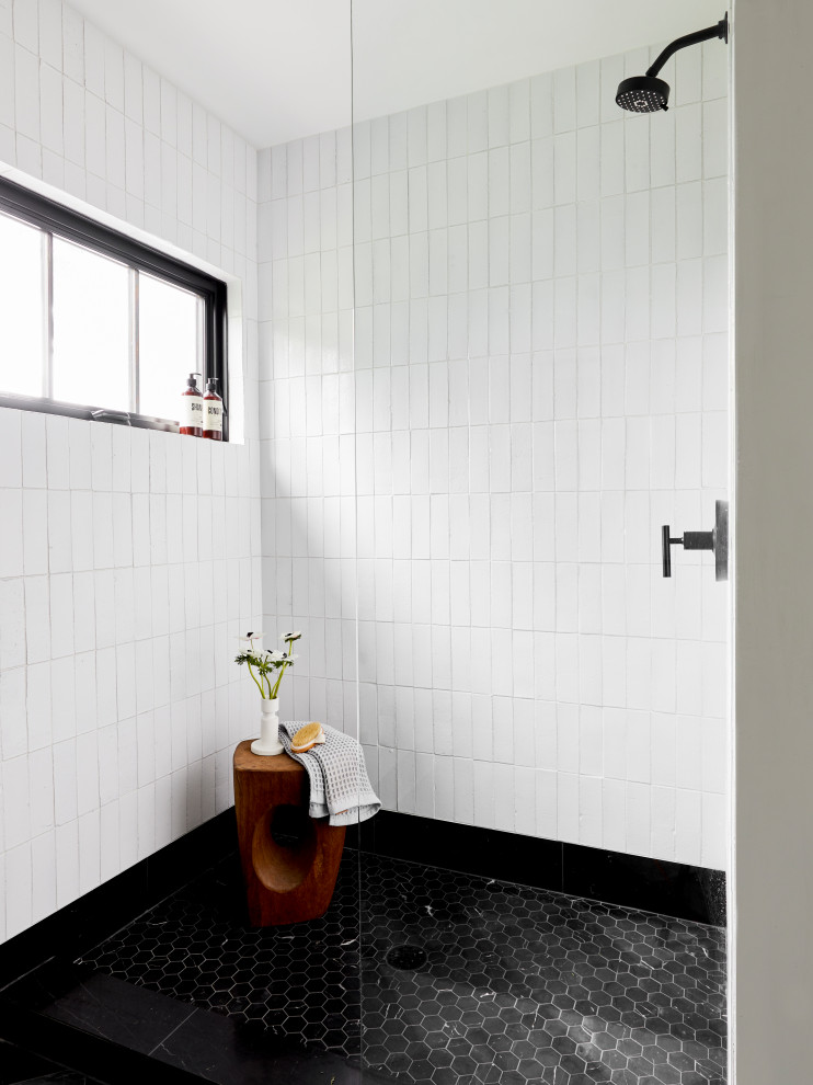 This is an example of a mid-sized transitional master bathroom in San Francisco with an open shower, white tile, ceramic tile, white walls, an open shower and brick walls.