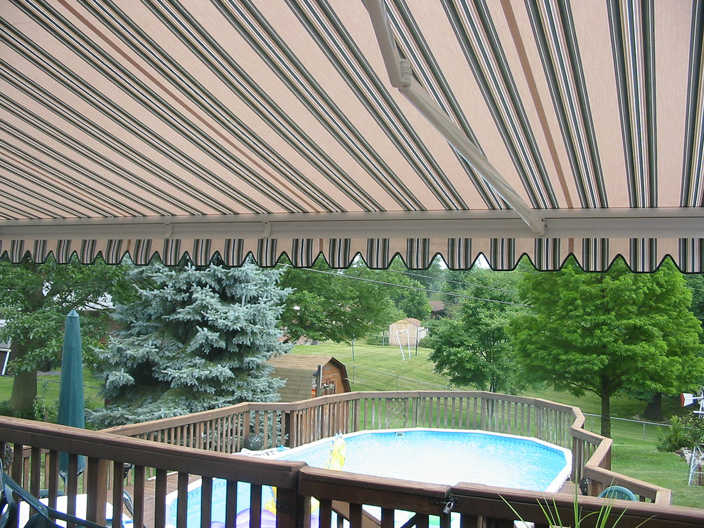 Design ideas for a backyard deck in Philadelphia with an awning.