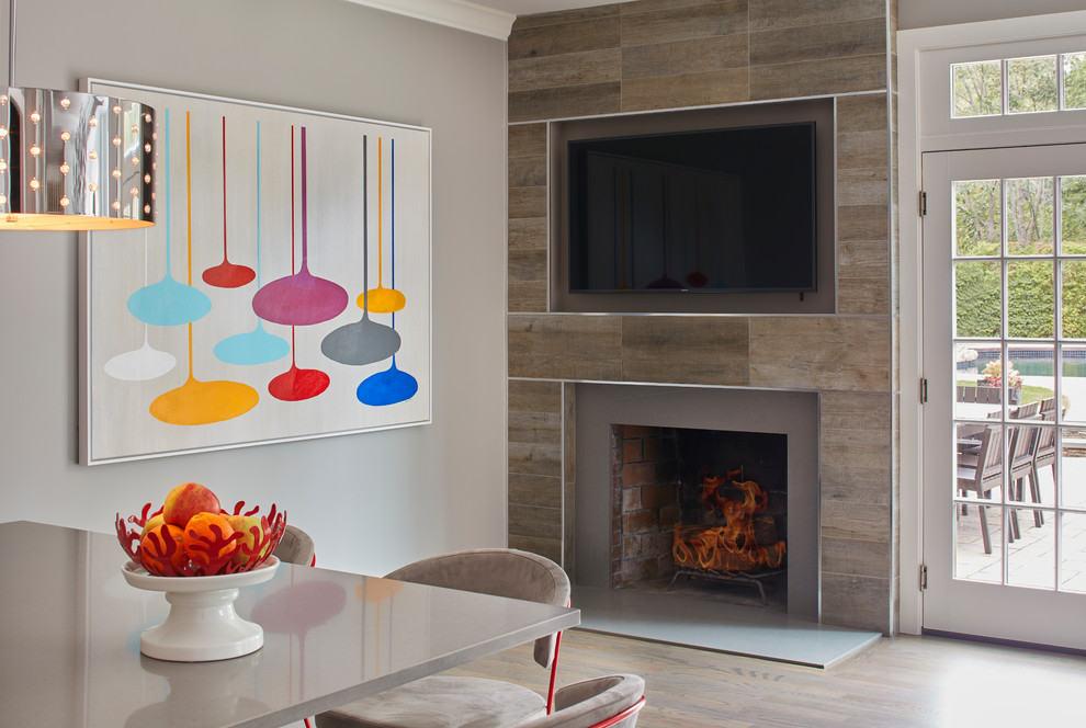 Example of a transitional home design design in Boston