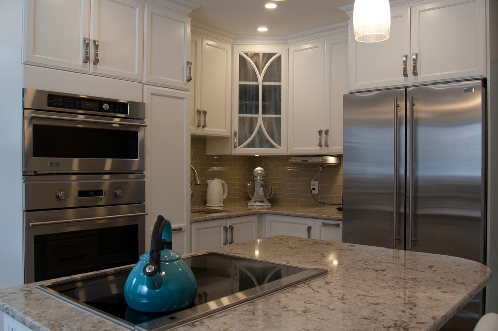 Kitchen - transitional kitchen idea in Ottawa with an island