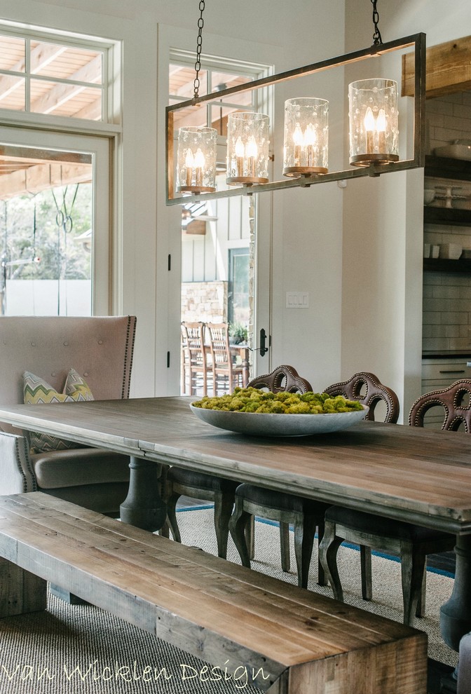 Example of a transitional dining room design in Austin