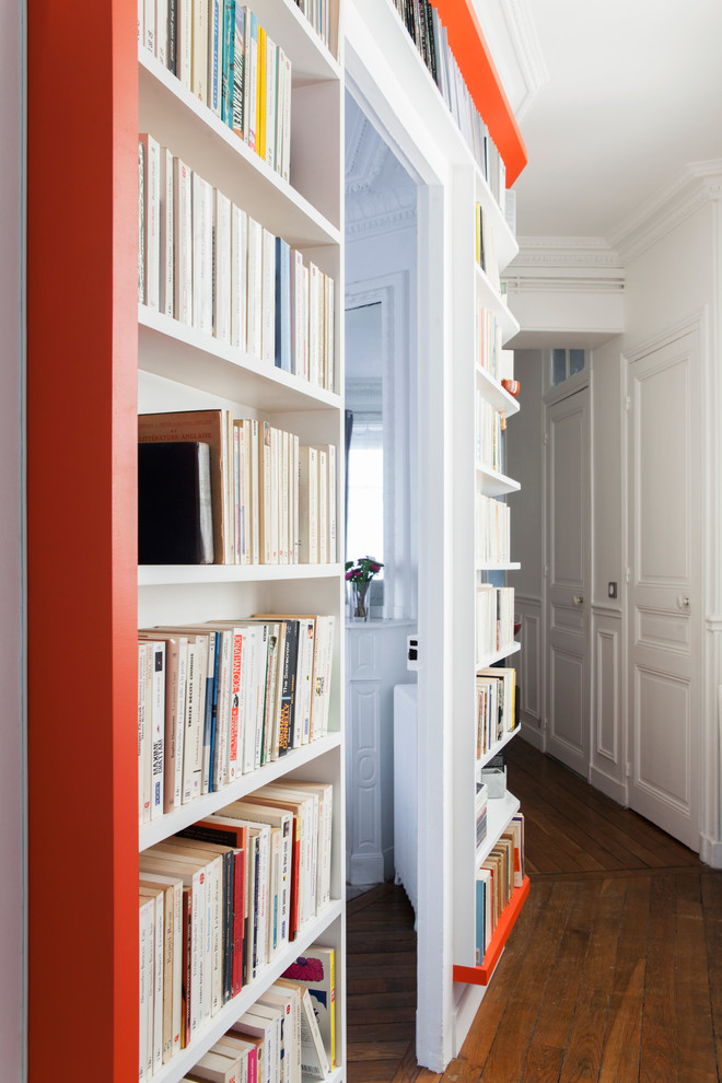 Inspiration for a large traditional hallway in Paris with white walls and medium hardwood floors.