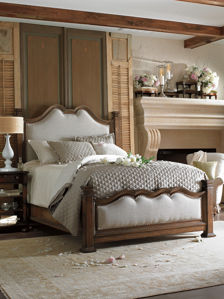 Design ideas for a large traditional master bedroom in San Francisco with white walls and dark hardwood floors.
