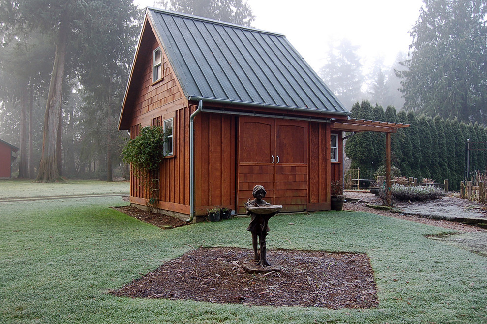 Design ideas for a mid-sized country detached garden shed in Seattle.
